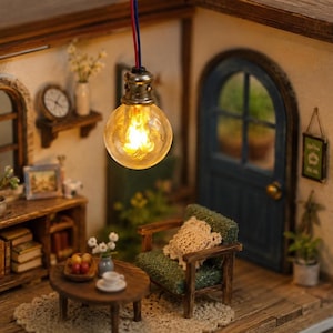 May include: Miniature dollhouse interior with a warm, inviting ambiance. A glowing light bulb hangs above a small wooden table, a green armchair, and a blue door. The scene includes a clock, books, and decorative items, creating a cozy atmosphere.