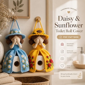 May include: Two handmade crochet toilet roll covers, one blue with daisy accents and the other yellow with sunflower and rose details. The covers are designed to look like dolls, with hats and dresses. The text reads "Daisy & Sunflower Toilet Roll Cover".