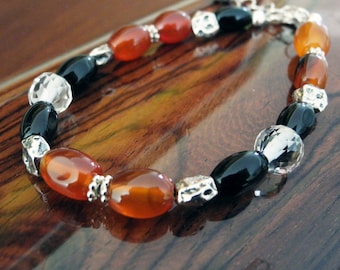 Beaded Bracelet made of Carnelian, Black Onyx, Vintage Clear Crystal Beads and .925 Sterling Components