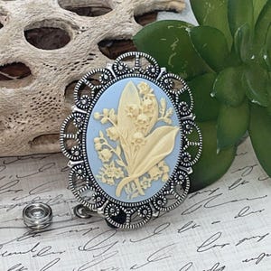 Bleu porte-badge pour carte d'identité avec enrouleur et cordon camée Lily Of The Valley