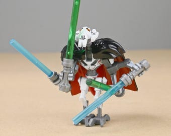 Minifigura del General Grievous, veterano de guerra ensangrentado con cuatro sables de luz, juguete de edición de coleccionista, regalo único para él o para los fans de Star Wars.