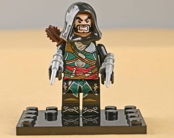 Minifigura de Ezio Auditore de AC Revelations, versión Elder, sabio mentor asesino, regalo único para papá o esposo, decoración de escritorio para gamers.