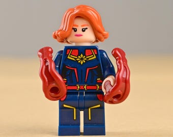 Minifigura de Capitana Marvel, heroína de energía cósmica con traje rojo y azul, juguete protector intergaláctico, regalo genial para decorar pasteles para niños o hijos.