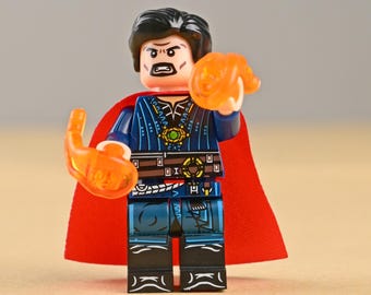 Minifigura de Doctor Strange, Hechicero Supremo con capa roja, juguete maestro de artes místicas, regalo mágico único para hombres o fans de Marvel.