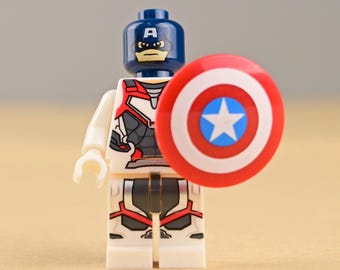 Minifigura del Capitán América con traje cuántico, armadura blanca y escudo de vibranio (juguete)