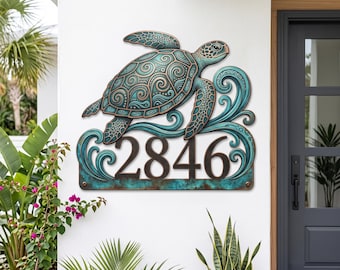 May include: A wall-mounted house number plaque featuring the digits 2846 in a dark bronze finish. The plaque displays a sculpted sea turtle with intricate teal and copper-toned swirling patterns, set against a backdrop of stylized ocean waves.