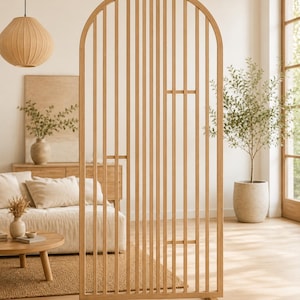 May include: A tall, arched room divider constructed from light-toned wood. The structure features a series of vertical slats arranged in a frame, with two horizontal crossbars positioned at different heights to provide stability and visual interest.