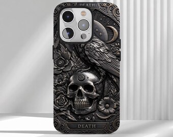 May include: A black phone case featuring a detailed embossed design of a skull, a raven, flowers, and a crescent moon. The word DEATH is printed at the top and bottom of the case. The design has a metallic, dark gray finish with intricate textures.