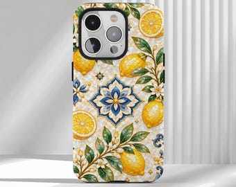 May include: A smartphone case featuring a mosaic-style pattern of yellow lemons, green leaves, white blossoms, and a central blue and white geometric floral tile design on a cream-colored background with a triple-lens camera cutout.