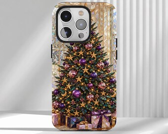 May include: A smartphone case featuring a printed design of a decorated Christmas tree with purple and gold ornaments, star-shaped decorations, and string lights. Several wrapped gift boxes are positioned at the base of the tree.