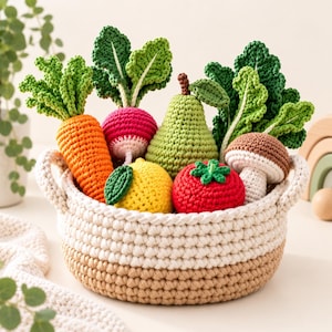 May include: A round, two-toned cream and tan crocheted basket filled with various crocheted produce items, including an orange carrot, a pink radish, a green pear, a yellow lemon, a red tomato, a brown mushroom, and leafy green vegetables.