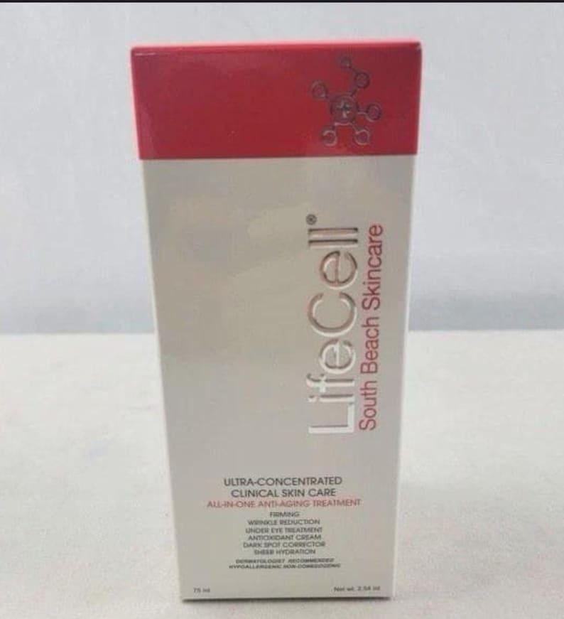 May include: A white box of LifeCell South Beach Skincare. The top of the box is red. The box contains text that reads "Ultra-Concentrated Clinical Skin Care All-in-One Anti-Aging Treatment". The box contains 75 ml / 2.54 fl oz.