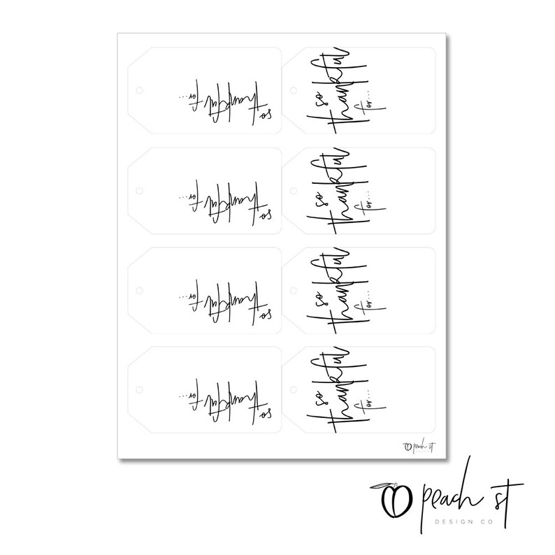May include: Set of four printable gift tags with the text "So thankful" and "Happy Holidays" in a handwritten font.