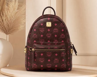 MCM Cinnamon Leather Backpack with Side Studs – Unisex Designer Fashion Bag | Luxury Travel Rucksack