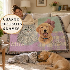 May include: A woven throw blanket featuring a portrait of a grey long-haired cat labeled Milo and a golden retriever labeled Amy, with a purple and green plaid background. A circular text overlay reads CHANGE PORTRAITS & NAMES.
