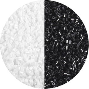 May include: A circular arrangement of small, cylindrical craft beads divided into two distinct halves. The left side features opaque white beads, while the right side consists of glossy black beads, both with a central hole for threading.