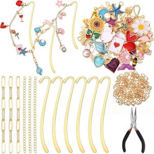 May include: A collection of crafting supplies including gold-colored bookmarks, charms, chains, jump rings, and pliers. The charms feature various designs such as hearts, flowers, and sea creatures. The pliers have black and red handles.