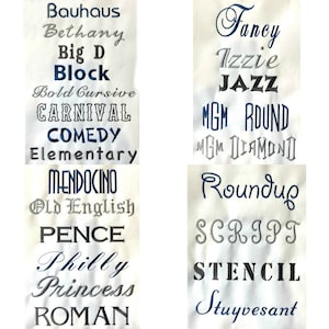 May include: A white fabric swatch with a variety of embroidered font styles in blue, gray, and black. The fonts include Bauhaus, Bethany, Big D, Block, Bold Cursive, Carnival, Comedy, Elementary, Mendocino, Old English, Pence, Philly, Princess, Roman, Fancy, Izzie, Jazz, MGM Round, MGM Diamond, Roundup, Script, Stencil, and Stuyvesant.