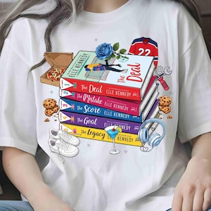 May include: White t-shirt with a design featuring a stack of books by Elle Kennedy, including "The Deal" and "The Mistake". The design also includes a hockey jersey, pizza, cookies, trainers, and a cocktail.