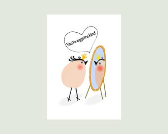 May include: A greeting card illustration featuring a light pink egg-shaped character with a small yellow crown, black hair, and rosy cheeks standing before an oval mirror with a gold frame. A speech bubble above contains the text You're eggstra kind.