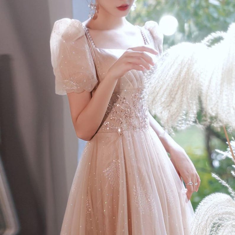Sparkle Princess Dress | Puff Sleeve Evening Gown | Party Wear | Chic Fairycore Style

Champagne sparkle princess dress with puff sleeves and elegant fairycore design