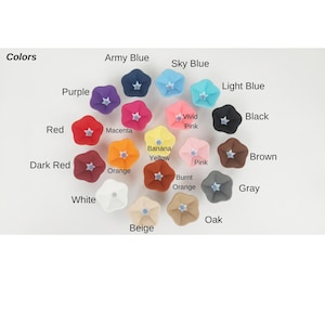 May include: A selection of flower-shaped items in a range of colours, including purple, red, and orange. The image features a colour chart with labels such as "Army Blue," "Sky Blue," and "Banana Yellow."