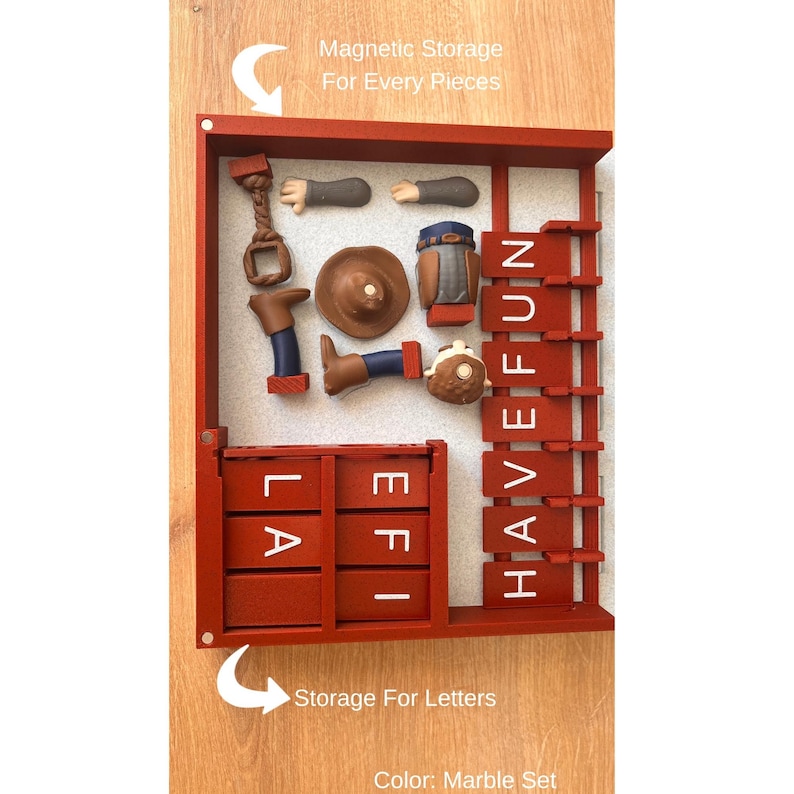 May include: A red wooden storage box with compartments for letters and magnetic storage for pieces. The box contains miniature cowboy-themed figurines and the words "HAVE FUN" and "LA EFI" in white letters. The text "Magnetic Storage For Every Pieces" is also visible.