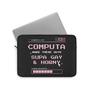 May include: A black laptop sleeve featuring a pink pixelated interface design. The text reads: > computa.exe, COMPUTA, MAKE THESE GUYS SUPA GAY & HORNY, and loading personality... with a progress bar and a mouse cursor icon.
