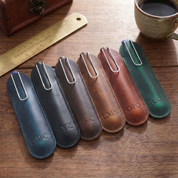 A hand-stitched single-pen leather sleeve with monogram — quietly luxurious EDC that fountain pen obsessives will immediately covet.