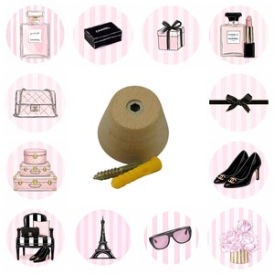 May include: A collection of illustrations on pink and white striped backgrounds. The illustrations include a perfume bottle, a black box, a gift box, a handbag, a wooden peg, a black bow, a stack of suitcases, a pair of high heels, a chair, the Eiffel Tower, sunglasses, and a bouquet of flowers.