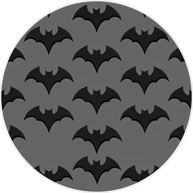 May include: Circular design featuring a repeating pattern of black bat silhouettes on a gray background. The bats are evenly spaced and create a symmetrical design. The overall aesthetic is simple and graphic.