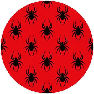 May include: A circular design featuring a repeating pattern of black spiders on a vibrant red background. The spiders are stylized with eight legs and a rounded body, creating a bold and eye-catching design.