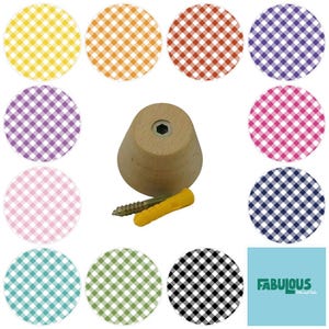 May include: A light-colored wooden wall hook with a conical shape, accompanied by a metal screw and a yellow plastic wall anchor. The image displays eleven circular swatches featuring various gingham check patterns in yellow, orange, red, purple, lavender, pink, light pink, teal, green, black, and navy blue.