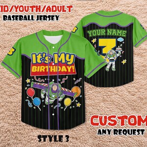 May include: Green and black baseball jersey with the text "It's My Birthday!" and a Buzz Lightyear graphic. The jersey has a button-up front and the text "YOUR NAME" on the back. The jersey is available in youth and adult sizes.