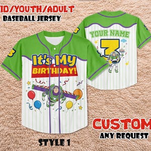 May include: Green and white baseball jersey with "It's My Birthday!" text and a Buzz Lightyear graphic. The jersey has a number 3 on the sleeve and the option to add a name. The jersey is available in youth and adult sizes.