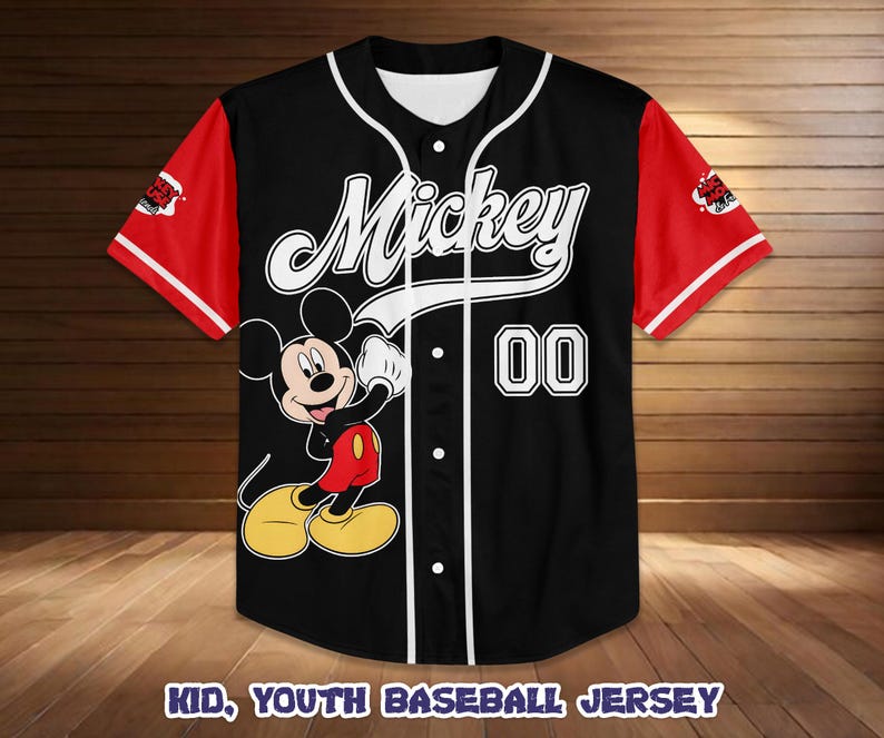 May include: Black baseball jersey with red sleeves and white accents. Features the word "Mickey" in white script, a cartoon image of Mickey Mouse, and the number "00". The text "KID, YOUTH BASEBALL JERSEY" is at the bottom.