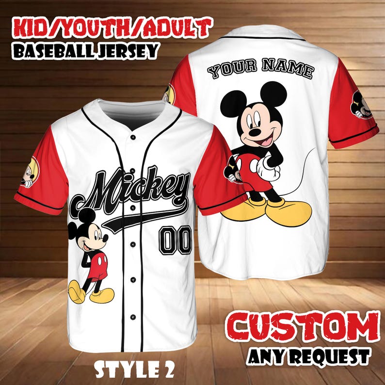 May include: White baseball jersey with red sleeves featuring a Mickey Mouse graphic. The jersey has the word "Mickey" and the number "00" on the front. The back of the jersey has the text "YOUR NAME". The image also includes the text "KID/YOUTH/ADULT BASEBALL JERSEY", "STYLE 2", and "CUSTOM ANY REQUEST".