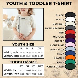 K&ouml;nnte beinhalten: Ein cremefarbenes Jugend-T-Shirt wird mit Gr&ouml;&szlig;en- und Farboptionen gezeigt. Die Breite des Shirts reicht von 38,71 bis 46,30 cm, und die L&auml;nge liegt zwischen 53,01 und 61,89 cm. Auch Kleinkindgr&ouml;&szlig;en sind verf&uuml;gbar.