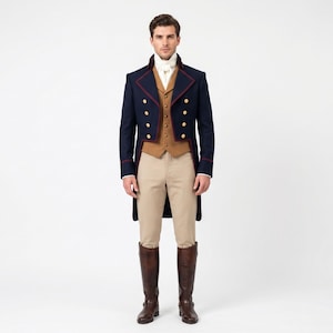 May include: A navy blue tailcoat with red piping and gold buttons, worn over a tan waistcoat, a white cravat, beige trousers, and tall brown leather boots. The ensemble features a structured collar, double-breasted front, and long coat tails.