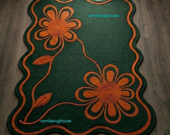 Smaragdgrüner Teppich mit floralem Muster