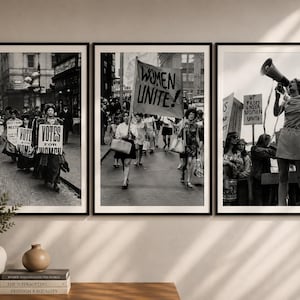 May include: A triptych of black and white wall art prints featuring historical protest scenes. The left panel shows suffragettes with signs reading VOTES FOR WOMEN. The centre panel displays a protest with a sign reading WOMEN UNITE. The right panel shows a person using a megaphone with a sign reading UP FROM UNDER WOMEN UNITE.