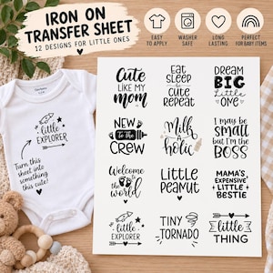 Può includere: Un foglio di trasferimento termoadesivo bianco con 12 disegni grafici neri con frasi come "Cute like my mom", "Eat sleep be cute repeat", "Dream big little one", "New to the crew", "Milk a holic", "I may be small but I'm the boss", "Welcome to the world", "Little peanut", "Mama's expensive little bestie", "Little explorer", "Tiny tornado" e "Little thing".