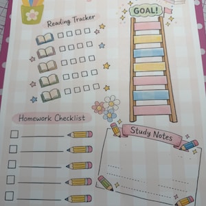 May include: A spiral-bound study planner page with a light pink and white checkered background. It features sections titled Study Planner, Reading Tracker with book icons, a ladder-shaped Goal tracker, a Homework Checklist with pencil icons, and a Study Notes box decorated with colorful flowers and pencils.