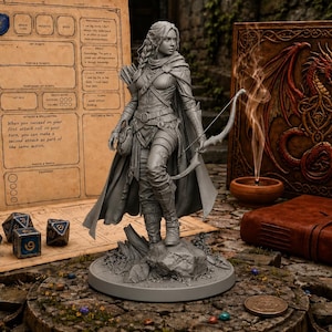 May include: A gray resin miniature figurine of an elf archer standing on a rocky base, holding a bow and quiver. The figure wears detailed leather armor and a cloak. Nearby are three polyhedral dice, a character sheet, and a leather-bound book.