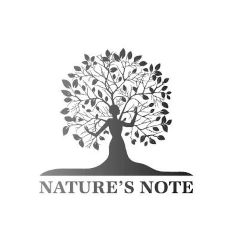 May include: Black and white silhouette of a woman standing inside a tree with leaves. The text "NATURE'S NOTE" is below the tree.