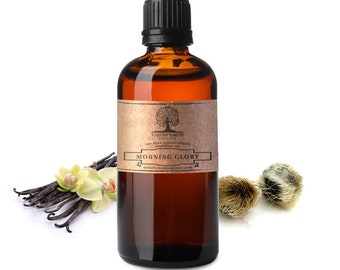 Puede incluir: Una botella de vidrio marrón con una tapa negra y una etiqueta de papel marrón. La etiqueta dice "Nature's Note" y "Morning Glory 100% Aceite Esencial de Aromaterapia Puro".