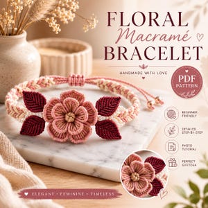 May include: A macramé bracelet featuring a central pink flower with layered petals, flanked by two dark red leaves on each side. The band is braided in light pink and cream cord with small white beads. Text includes FLORAL MACRAMÉ BRACELET.