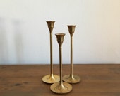 brass candlestick holders. graduating candlestick holders. mid century tulip candlestick holders. boho decor mid century candlestick holders