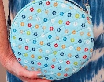 Blue print quilted round crossbody bag
