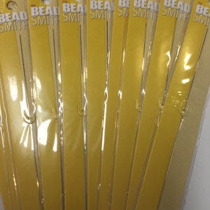 May include: A package of eight 5-inch Bead Smith Big Eye Beading Needles. The needles are packaged individually in clear plastic.